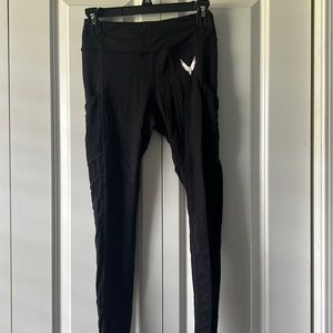 logan paul leggings, mesh goes down the leg. It has pockets on each side